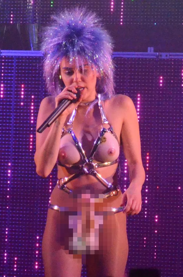 andrew dangerfield recommends miley cyrus naked on stage pic