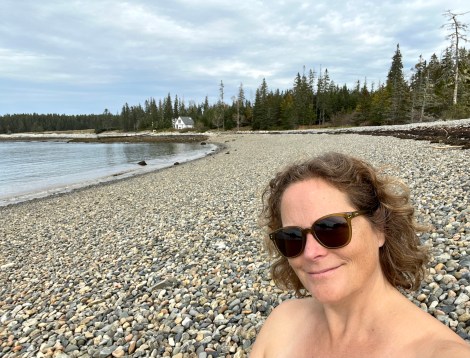 abbey clifford add topless beach photo