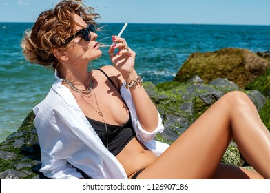 anne matt recommends busty milfs smoking pic