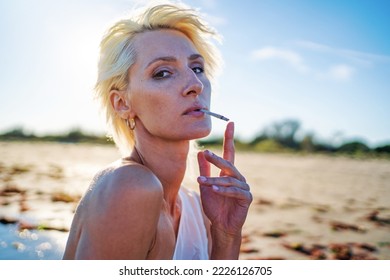 avi deutsch recommends busty milfs smoking pic