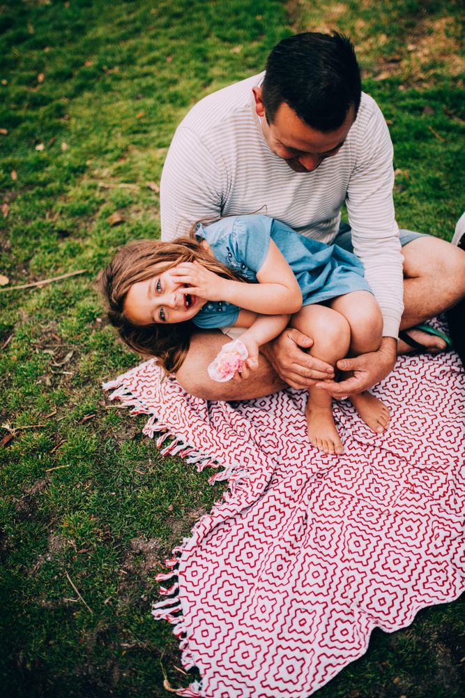 daughter sitting on daddys lap