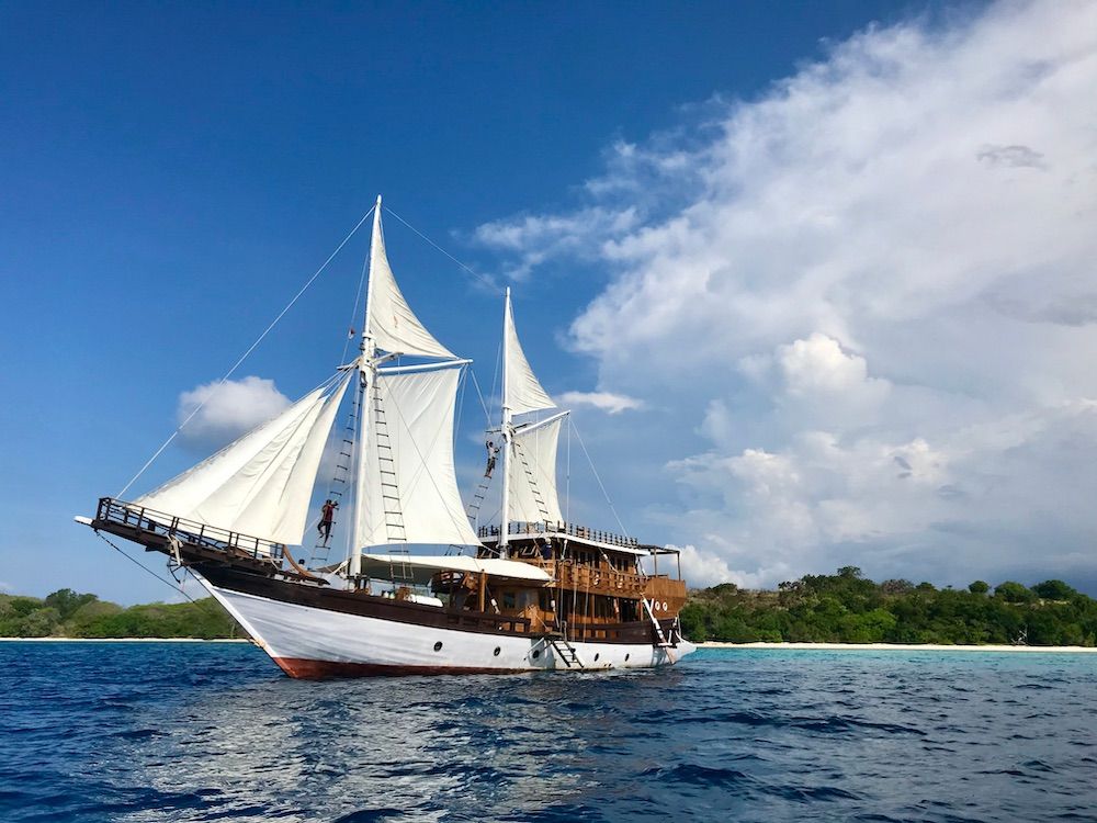 dean fergusson add naked sailing photo