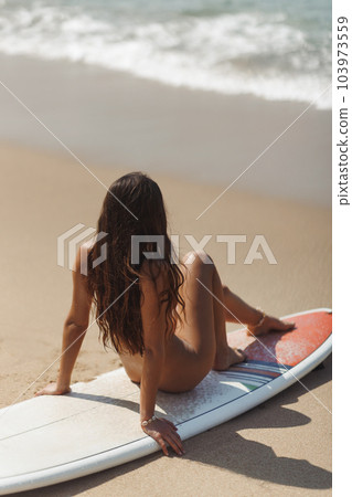 naked surfboarding