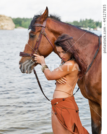 adelina vasileva add naked woman on horseback photo